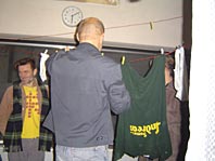 Andreas Kallfelz adjusts a T-Shirt